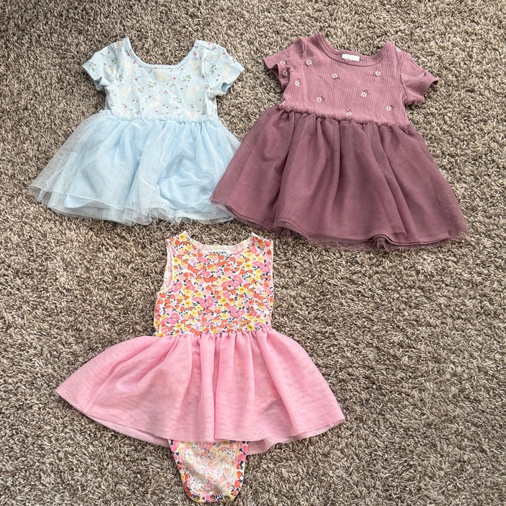 Set of Three Baby Dresses in Blue, Purple, and Pink